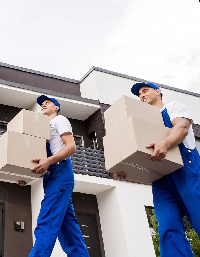Carrying boxes into a property